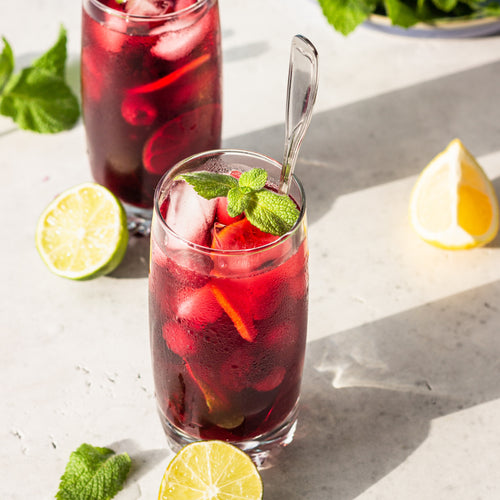 Iced hibiscus lemonade served over ice